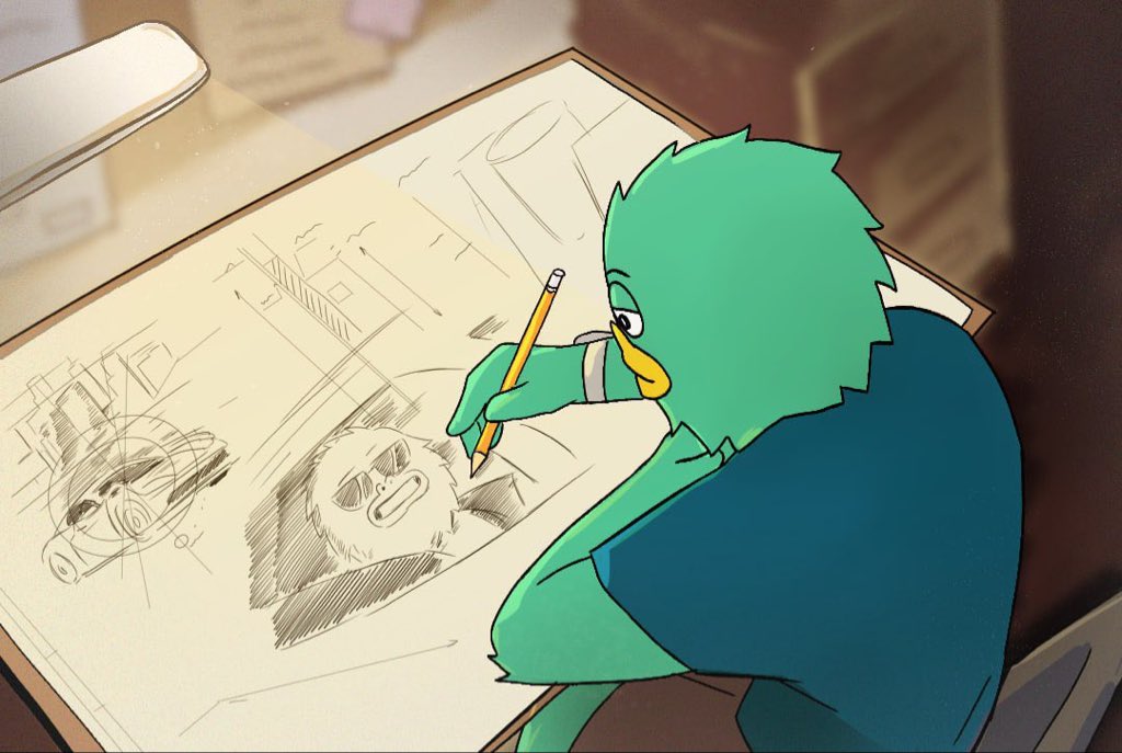 Yeti sketching comic panels at a desk lamp